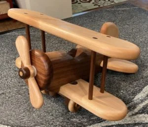 Finished wooden biplane toy
