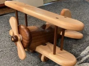Finished wooden biplane toy