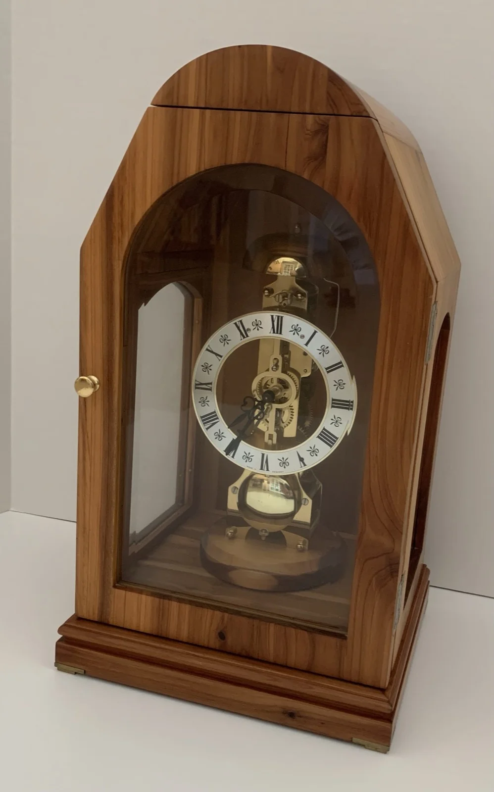 Finished mantel clock with skeleton dial and cedar case