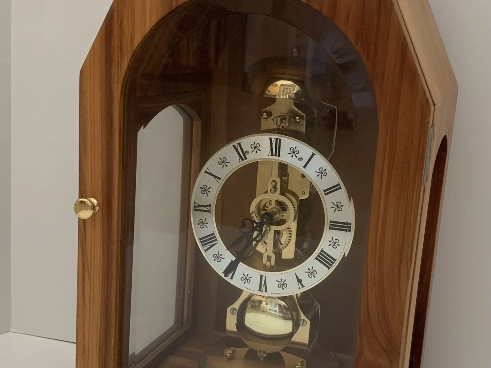 Finished mantel clock with skeleton dial and cedar case