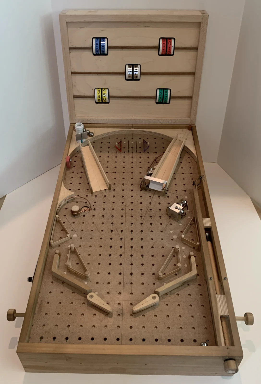 Finished mechanical pinball machine with scoreboard open