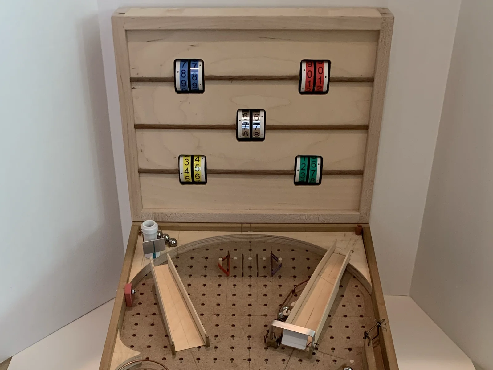 Finished mechanical pinball machine with scoreboard open